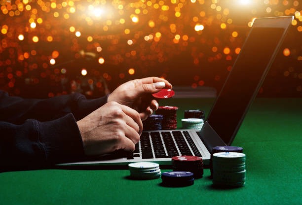 Live dealer rolling three dice in Sic Bo game